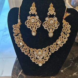 Gold necklace set , with gold earrings